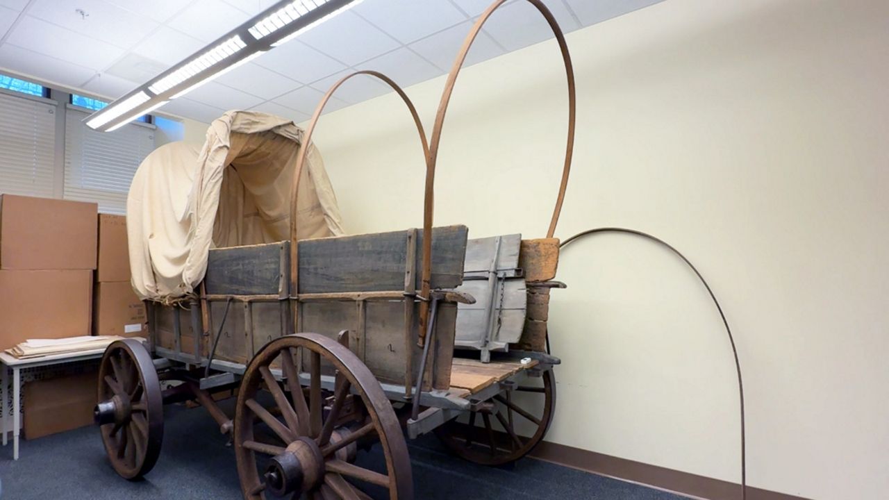 A historic wagon is one of the many artifacts now housed in the Gateway Arch Research Center at the Old Post Office. (Spectrum News/Elizabeth Barmeier)