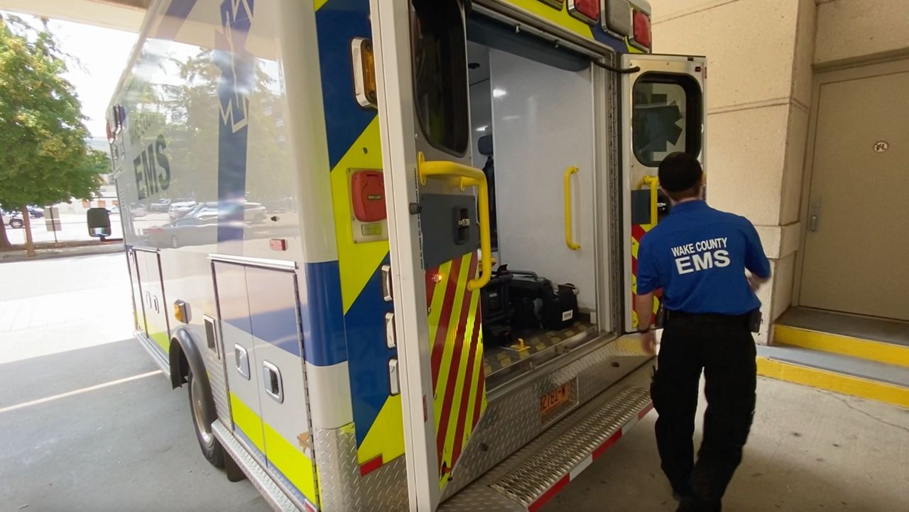 Wake County EMS staff member in an ambulance bay in Raleigh.