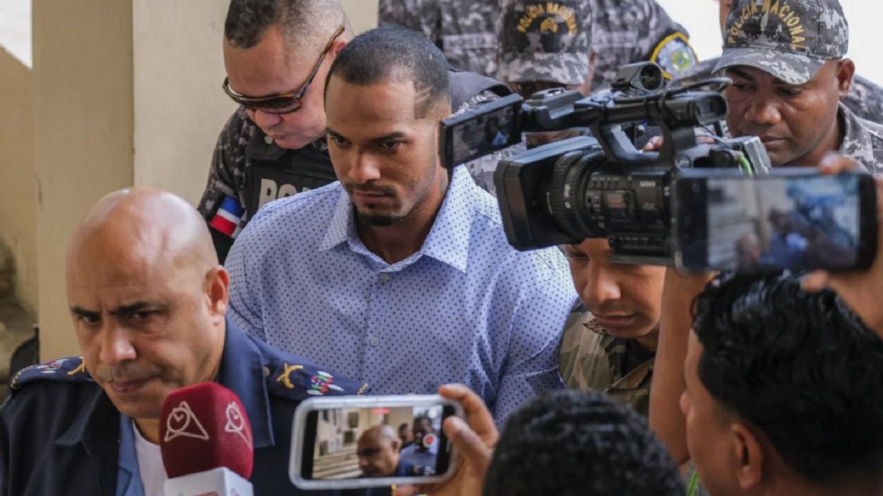 Tampa Bay Rays shortstop Wander Franco, center, is escorted by police to court in Puerto Plata, Dominican Republic Friday, Jan. 5, 2024. Dominican prosecutors on Wednesday accused Franco of commercial sexual exploitation and money laundering following allegations that he had a relationship with a minor whose mother also faces the same charges. (AP Photo/Ricardo Hernández)