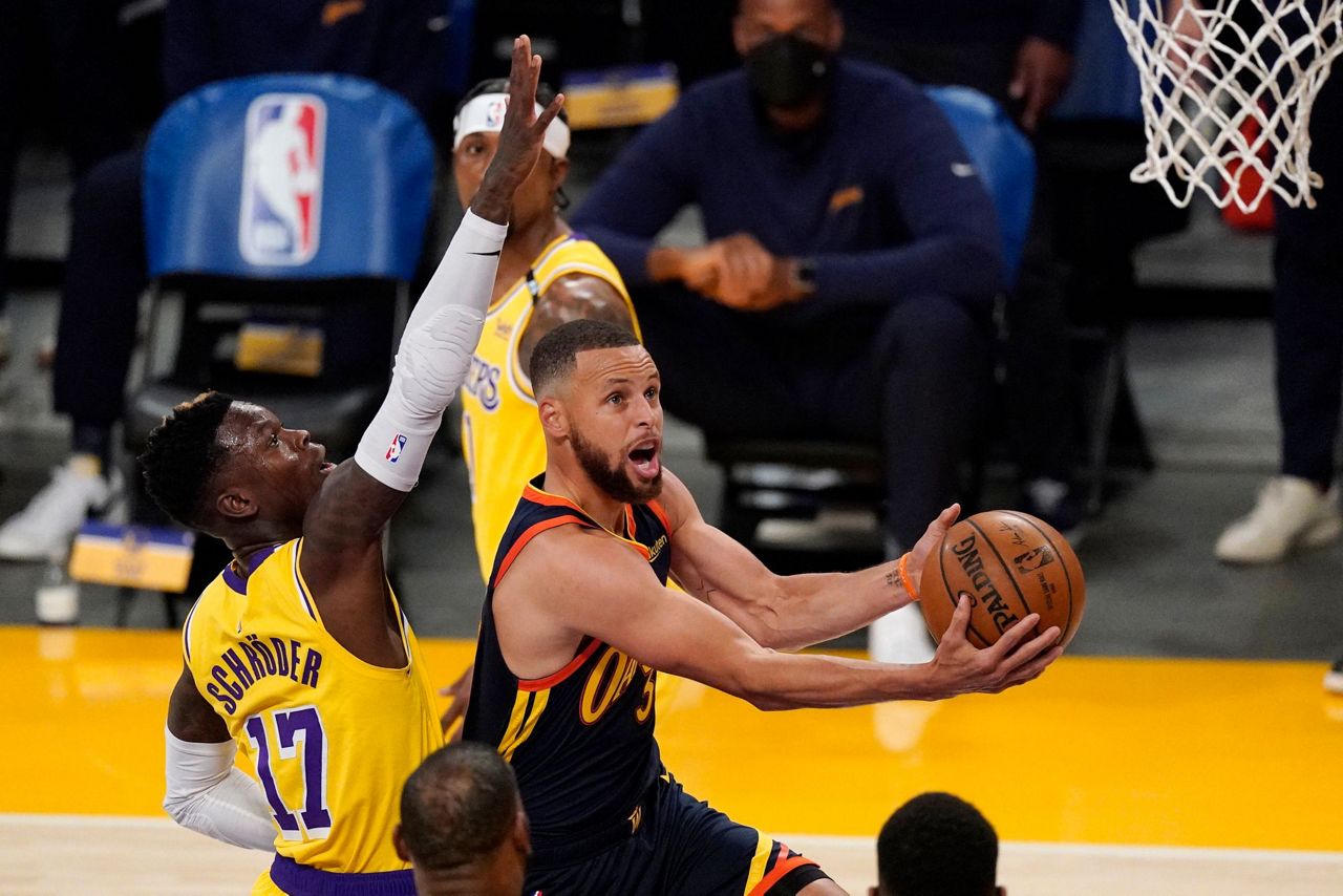 LeBron's 3 lifts Lakers over Warriors in West play-in game