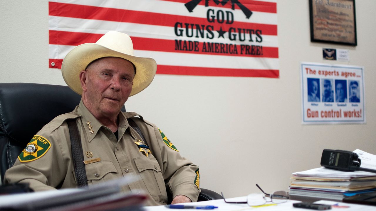 In this photo provided by the Arizona Center for Investigative Reporting, Klickitat County Sheriff Bob Songer talks in his office in Goldendale, Wash., July 5, 2023. Songer is an advisory board member of the Constitutional Sheriffs and Peace Officers Association and has faced harsh criticism for his embrace of the organization's ideology about the extent of the power of the sheriff. (Isaac Stone Simonelli/Arizona Center for Investigative Reporting via AP)