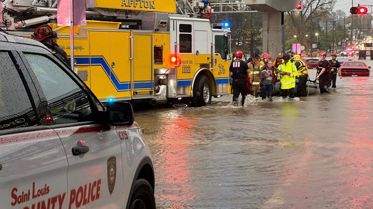 Stranded motorists were rescued from fast moving water at Bayless Avenue and Interstate 55 Tuesday morning by area first responders. (Photo courtesy of the Affton Fire Protection District/Facebook) 