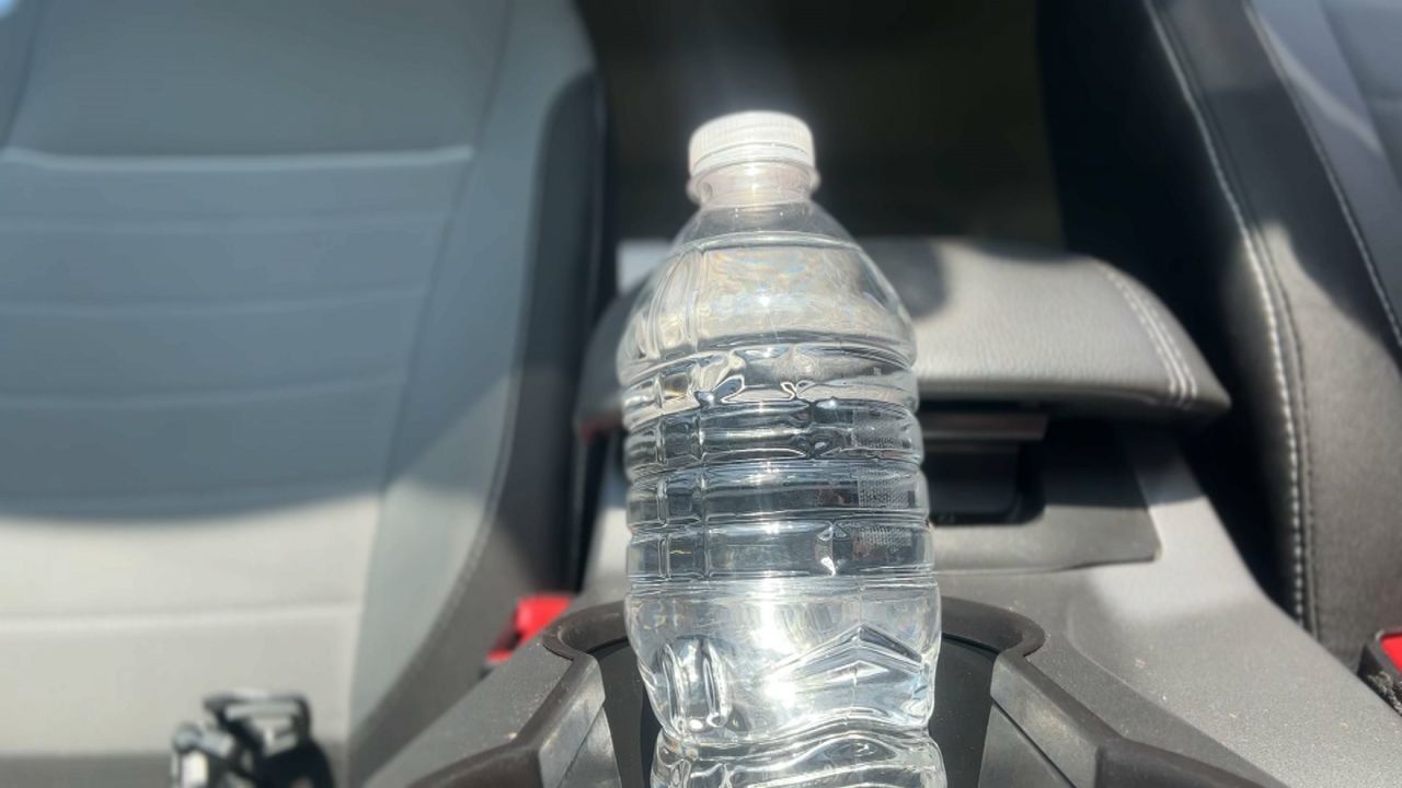 Scientists say water bottles left in the sun can release chemicals.  (Spectrum News 1)