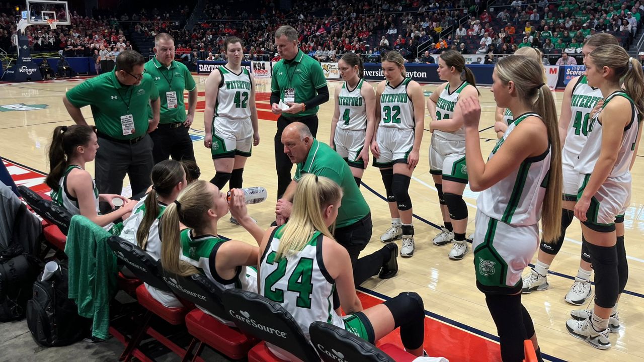 The Waterford High School girls basketball team huddles together before the OHSAA Girls State Tournament final at UD Arena on Saturday.