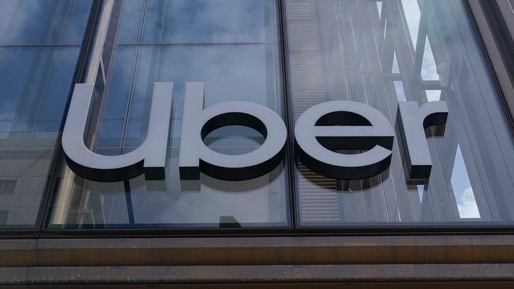 An Uber sign is displayed at the company's headquarters in San Francisco, Monday, Sept. 12, 2022. (AP Photo/Jeff Chiu, File)