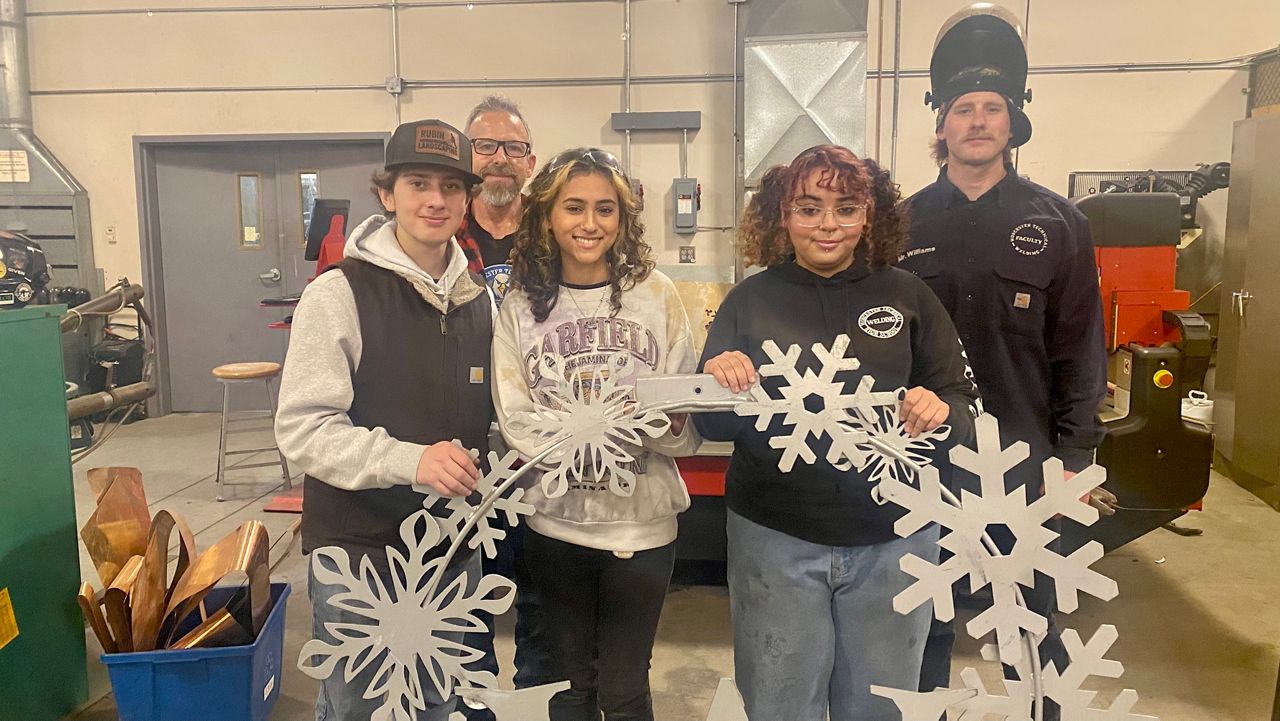 Worcester welding students make, repair holidays wreaths