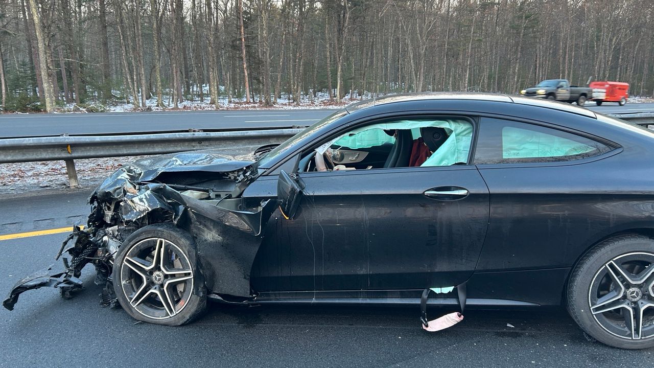This vehicle was damaged after striking a Maine State Police cruiser Friday. (Maine Department of Public Safety)