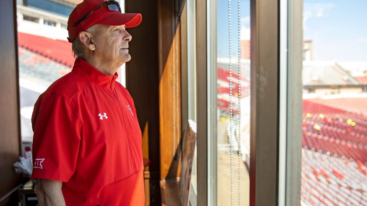 Texas Tech track and field coach Wes Kittley stands in his office Sept. 24, 2022, in Lubbock, Texas. Kittley has agreed to a new $3.8 million, seven-year contract before going into what will be his 25th season, and make him the longest-tenured head coach in any sport ever at the Big 12 school. The contract formally approved Thursday, Aug. 10, by Texas Tech regents also includes potential performance bonuses for the 64-year-old coach. (AP Photo/Brad Tollefson)