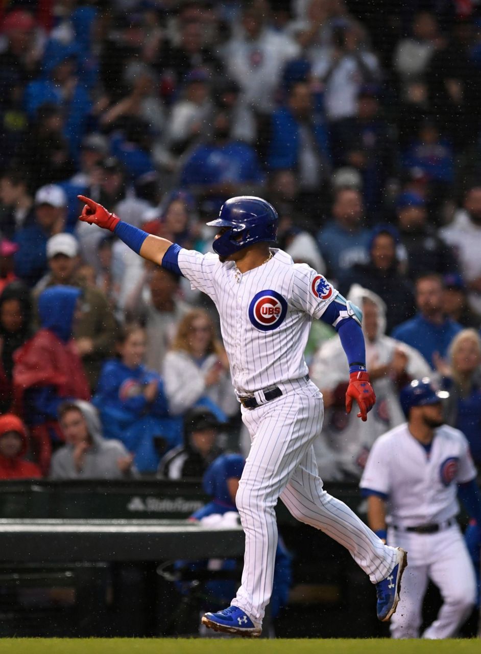 Walker's slam lifts Pittsburgh past Chicago Cubs at Wrigley