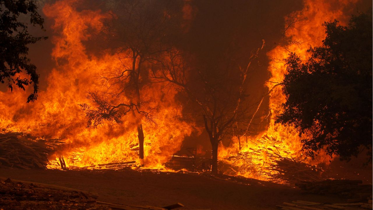Wildfires burning. (AP Images)