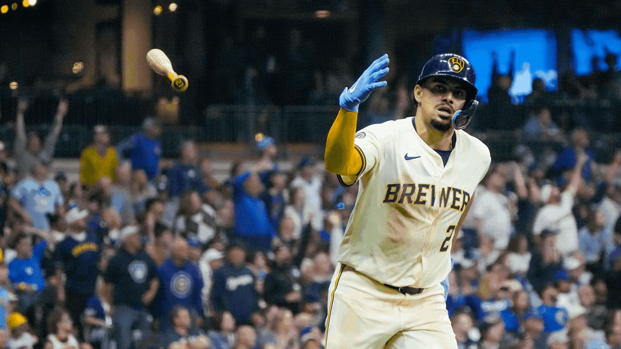 Milwaukee Brewers' Willy Adames reacts after hitting a two-run home run