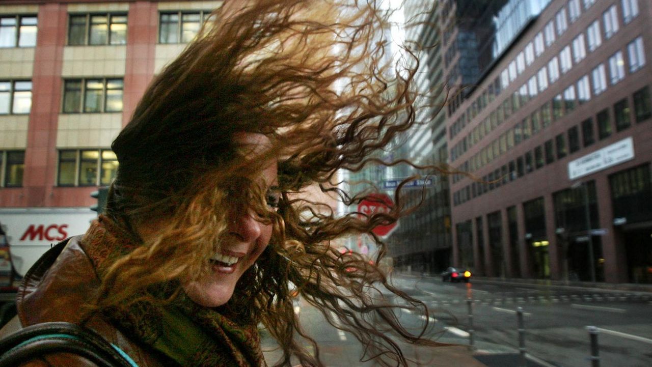 Winds whip down a street in Frankfurt, Germany