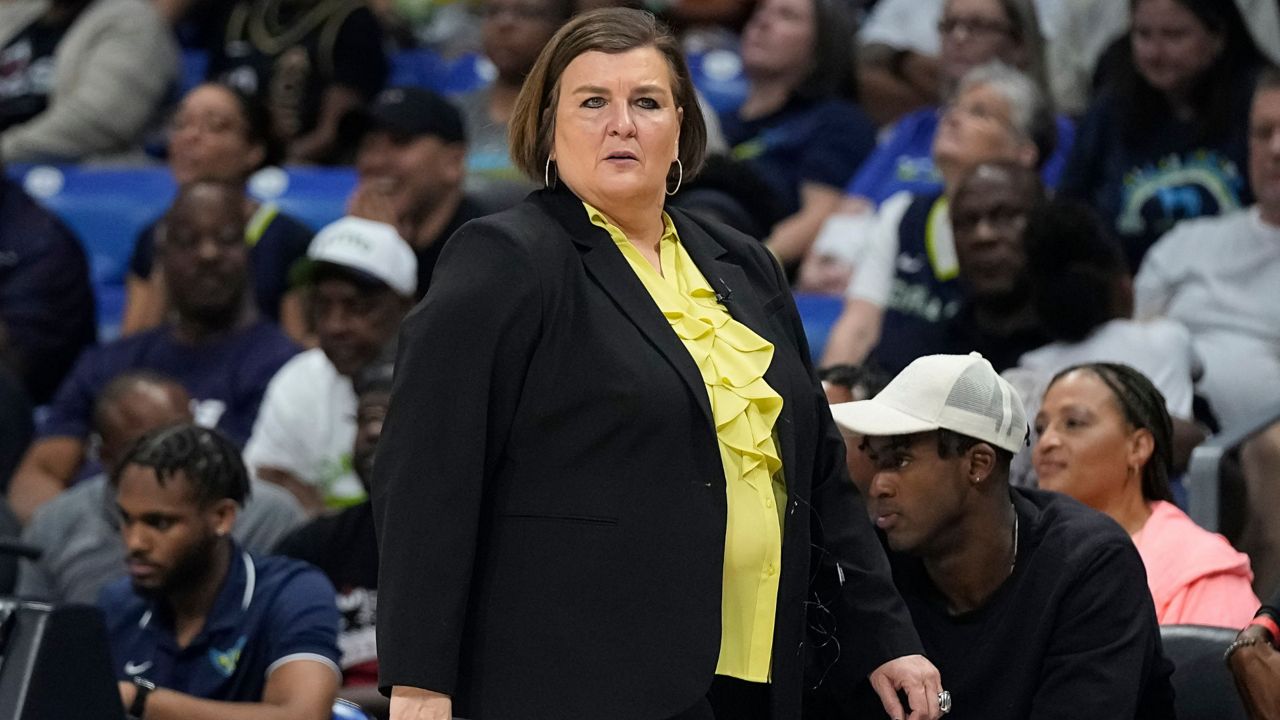 Dallas Wings head coach Latricia Trammell walks along the court during the second half of Game 3 of a WNBA basketball playoffs semifinal against the Las Vegas Aces, Sept. 29, 2023, in Arlington, Texas. (AP Photo/Sam Hodde, File)