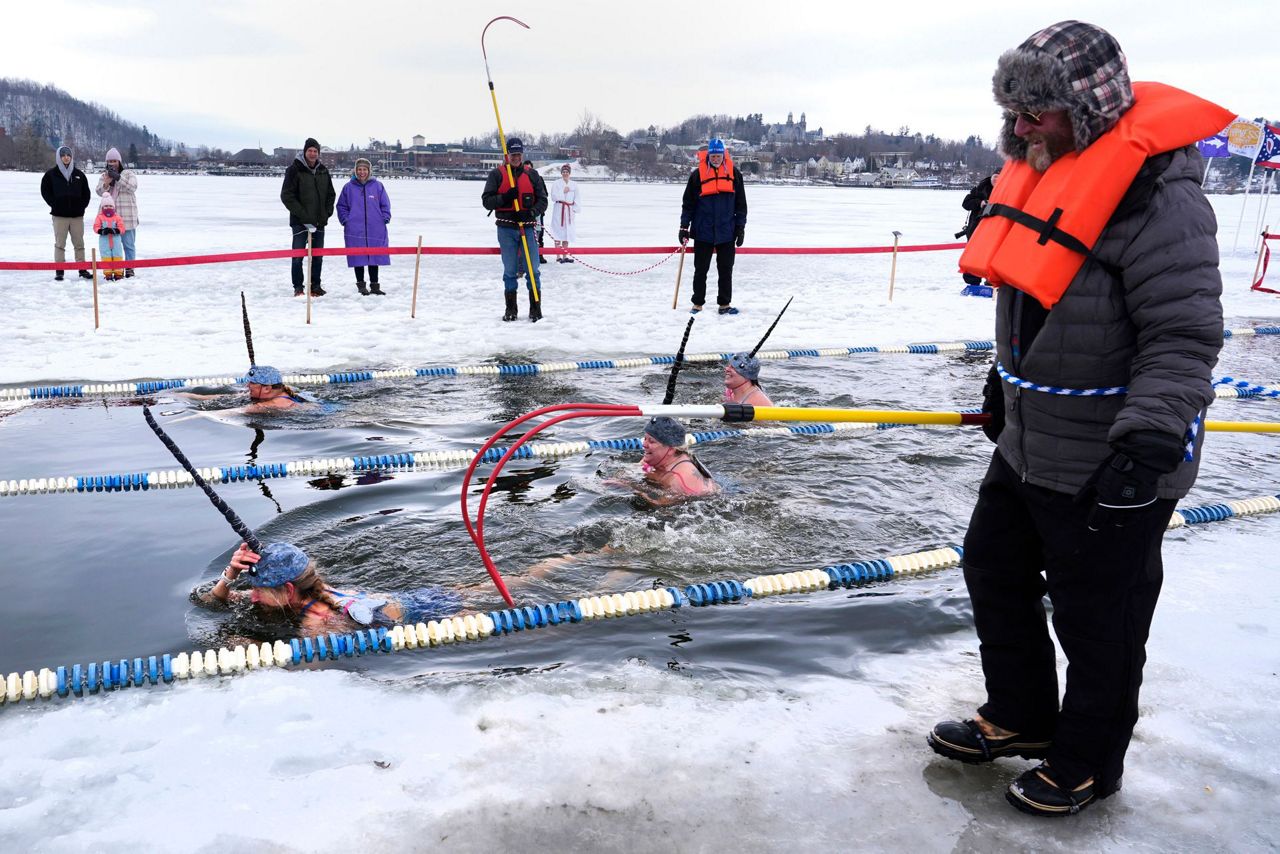 'Totally cold' is not too cold for winter swimmers competing in a ...