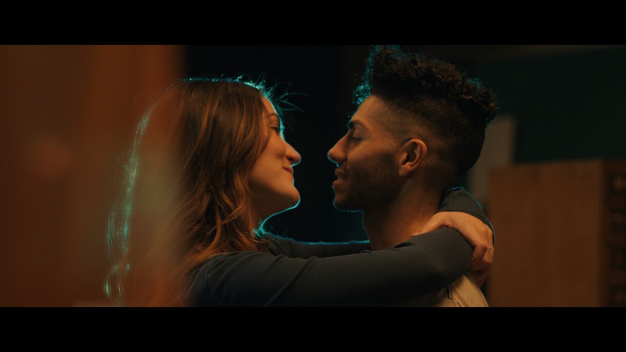Isabelle Fuhrmanas “Charlotte” and Mena Massoud as “Adam” in “Wish You Were Here.” (Photo courtesy of Lionsgate)