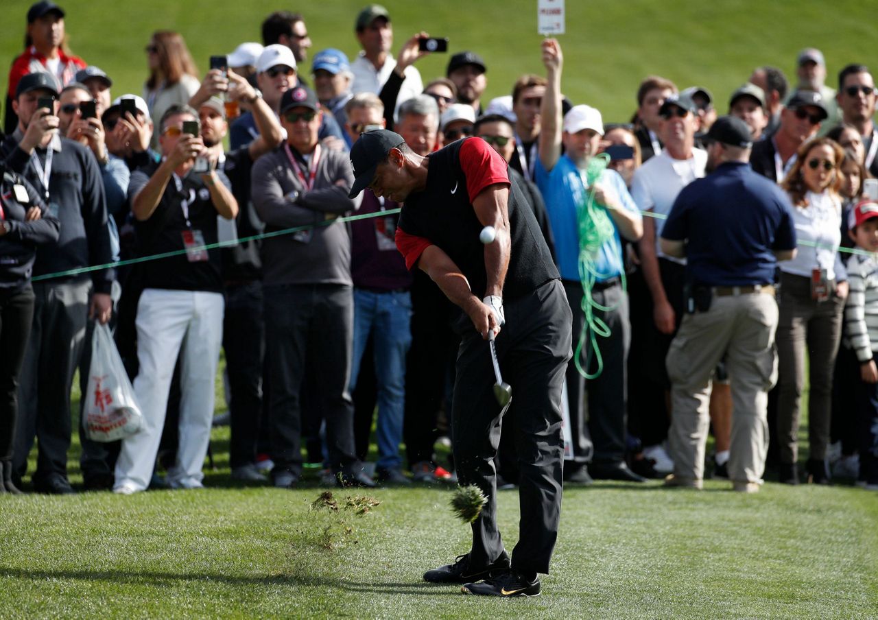 Mickelson wins match against Woods with birdie on 22nd hole