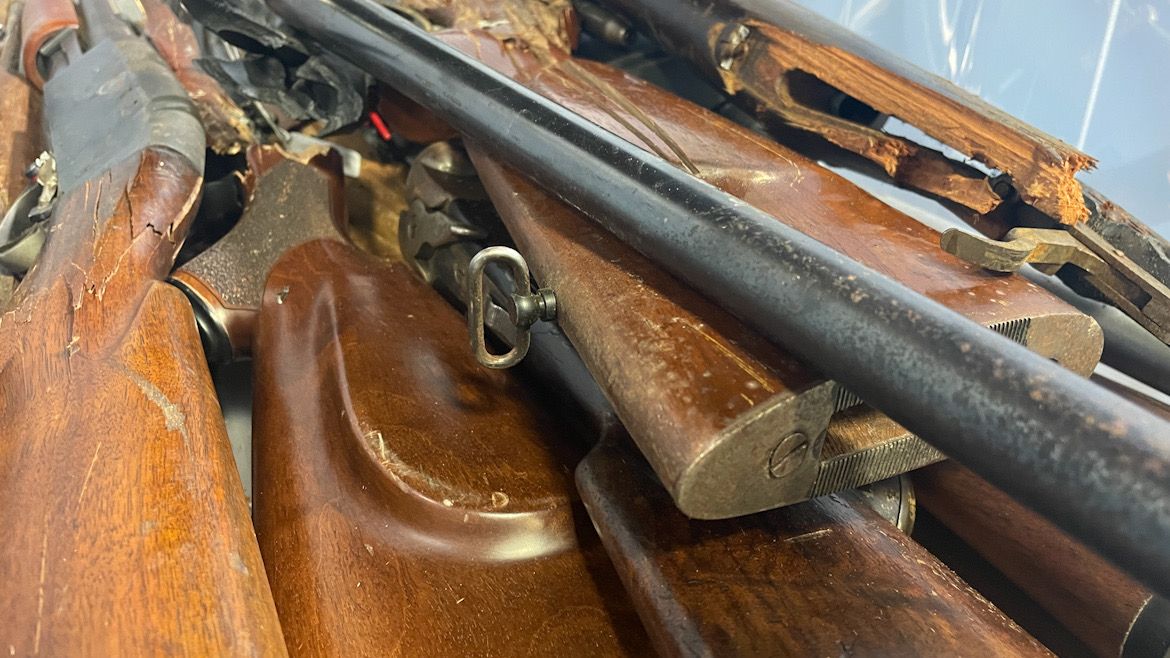 Guns from a Worcester, Mass., gun buyback event. (Spectrum News 1/Richard Damas)