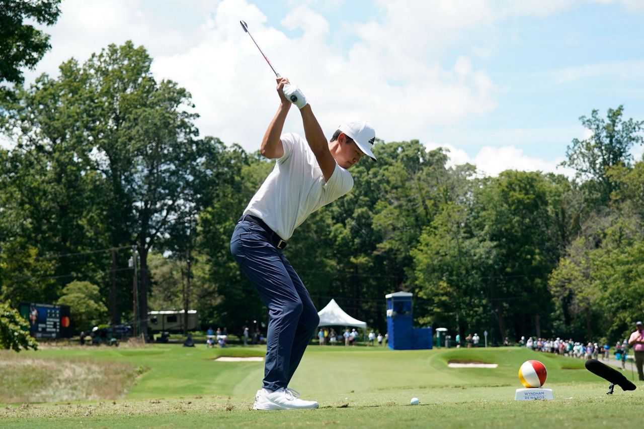 Kim arrives on PGA Tour with 61 to win Wyndham Championship