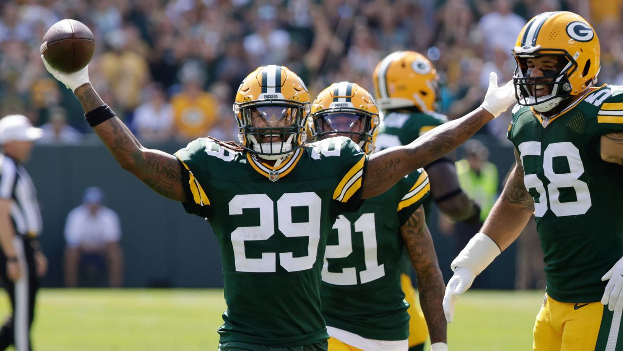 Green Bay Packers safety Xavier McKinney (29) reacts after intercepting a pass during the first half of an NFL football game against the Indianapolis Colts Sunday, Sept. 15, 2024, in Green Bay, Wis. (AP Photo/Mike Roemer)