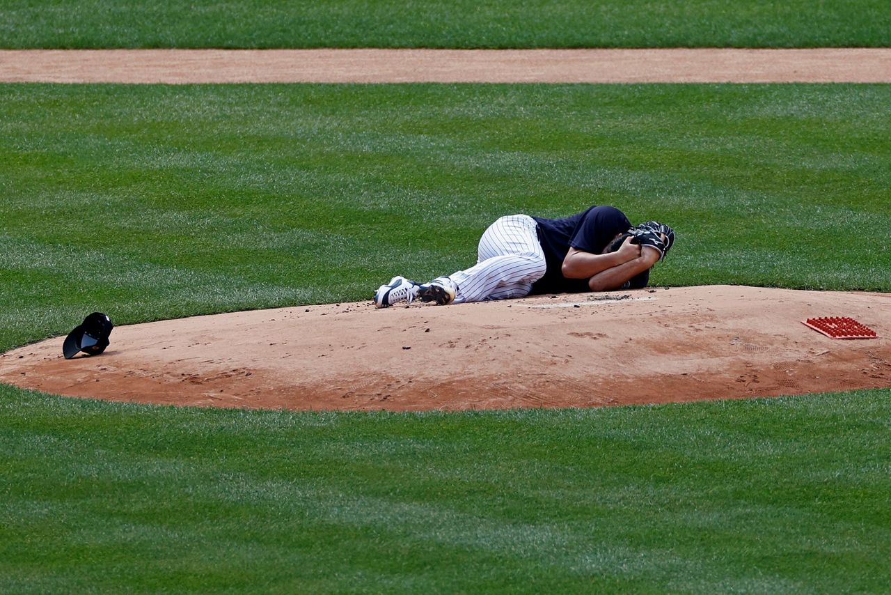 Yankees pitcher Tanaka hit in head by Stanton line drive