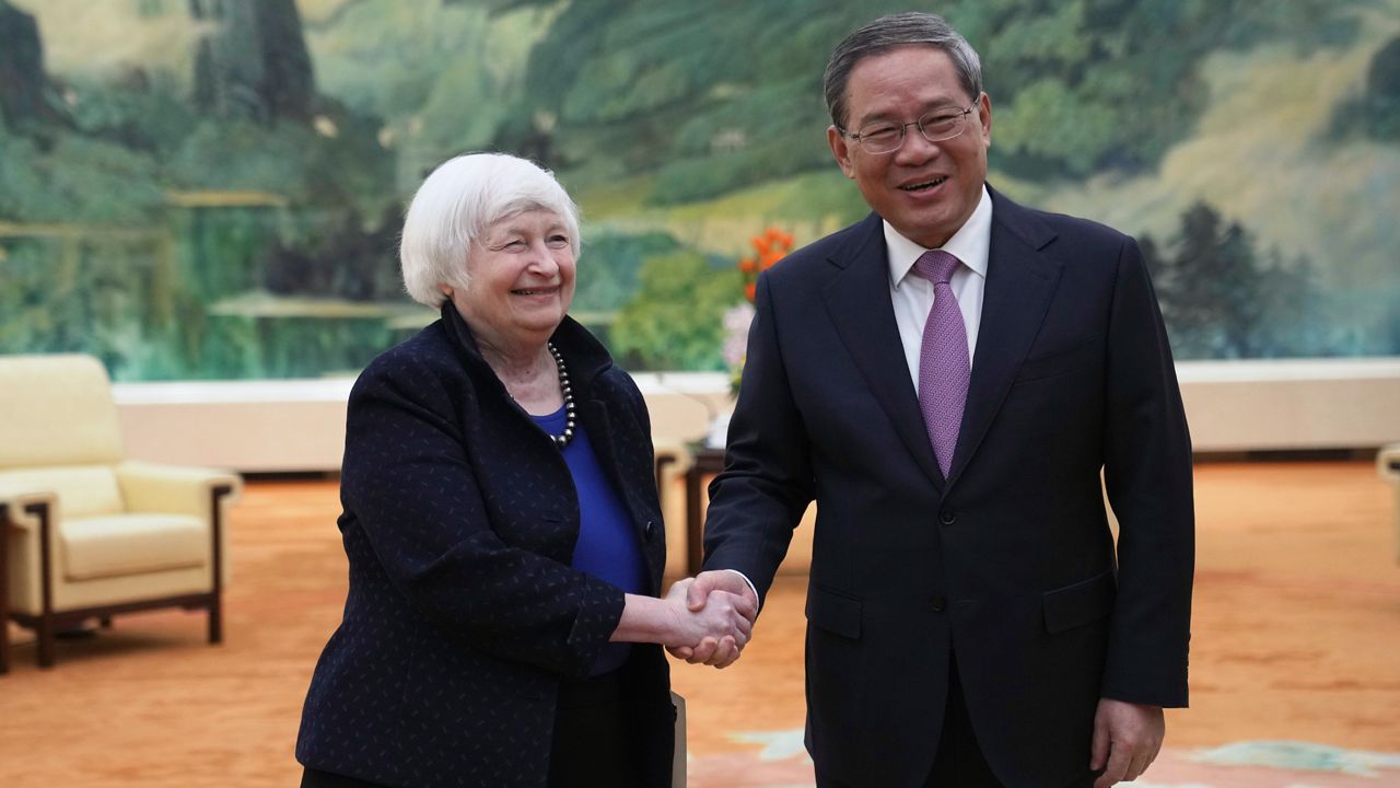 Treasury Secretary Janet Yellen, left, meets Chinese Premier Li Qiang at the Great Hall of the People in Beijing, China, Sunday, April 7, 2024. Yellen, who arrived later in Beijing after starting her five-day visit in one of China's major industrial and export hubs, said the talks would create a structure to hear each other's views and try to address American concerns about manufacturing overcapacity in China. (AP Photo/Tatan Syuflana, Pool)