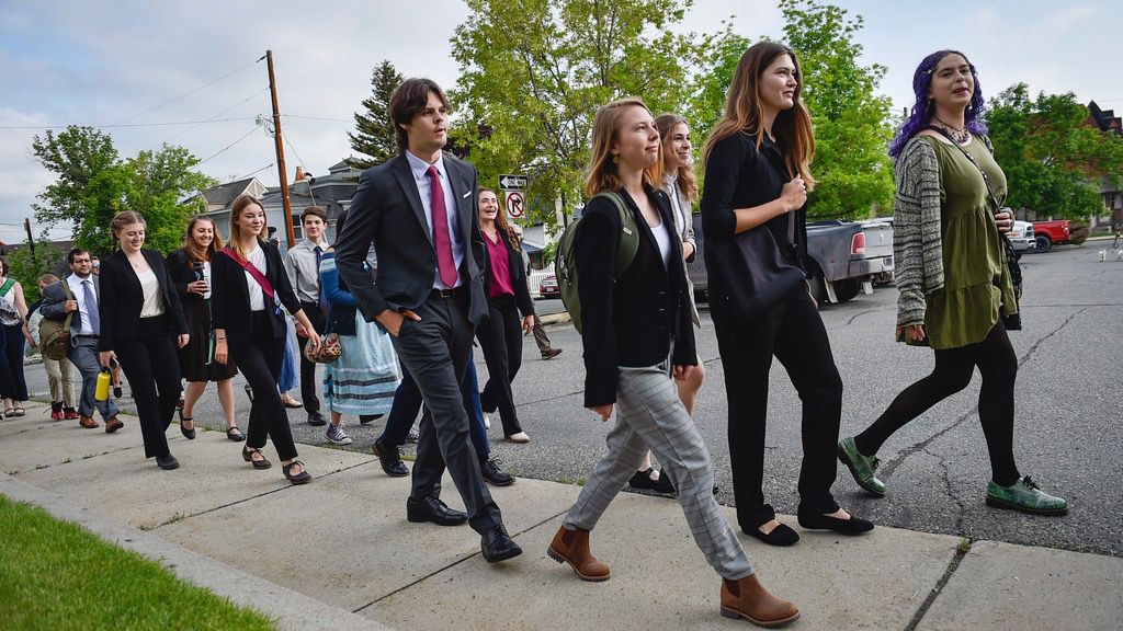 Young plaintiffs in a climate lawsuit challenging Montana's government for not doing enough to combat climate change are seen outside the Lewis and Clark County courthouse, June 12, 2023, in Helena, Mont. (Thom Bridge/Indpendent Record via AP)