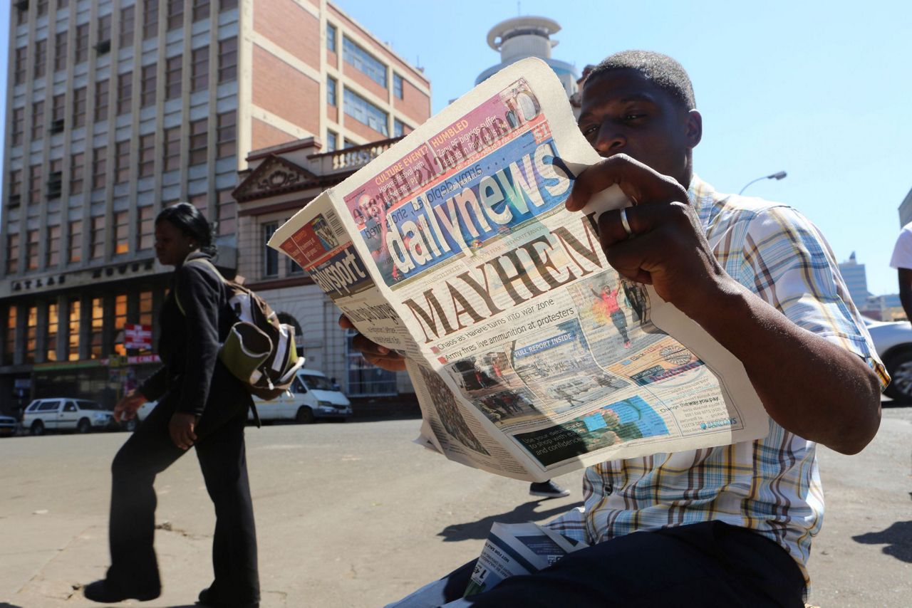 The Latest: Zimbabwean soldiers clearing capital's streets