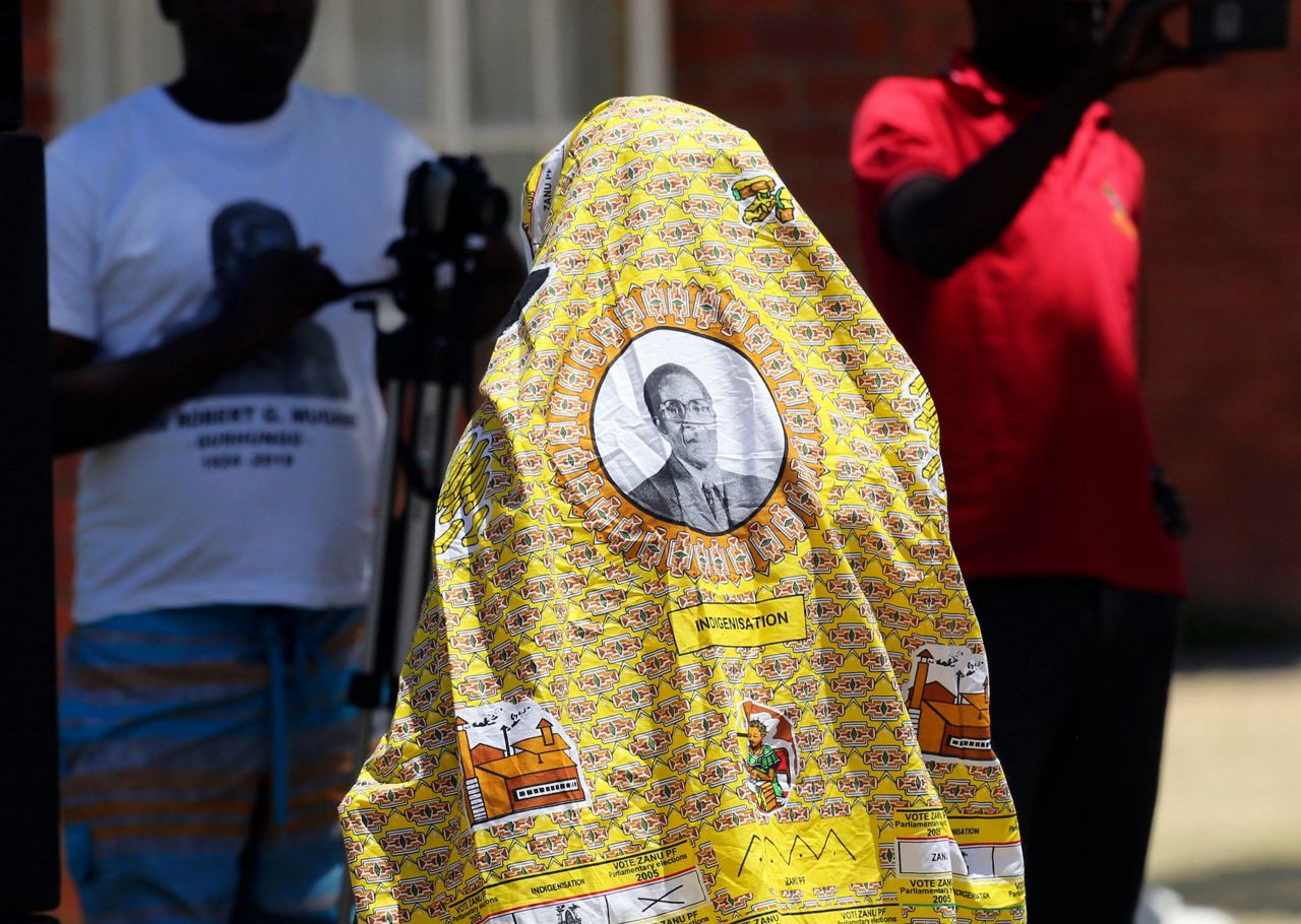 Security tight as Zimbabwe's Mugabe gets a private burial