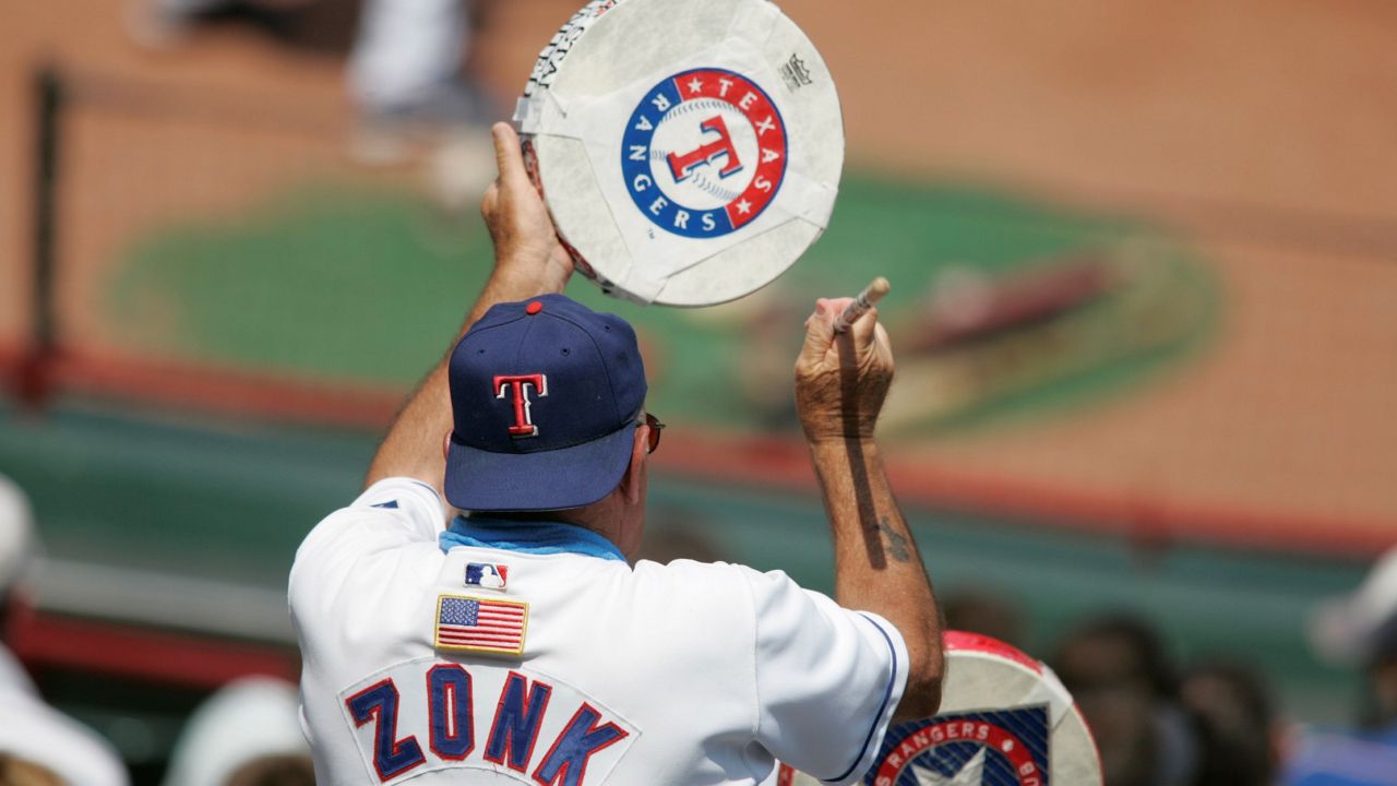 John 'Zonk' Lanzillo with his drum at a game. (Texas Rangers)