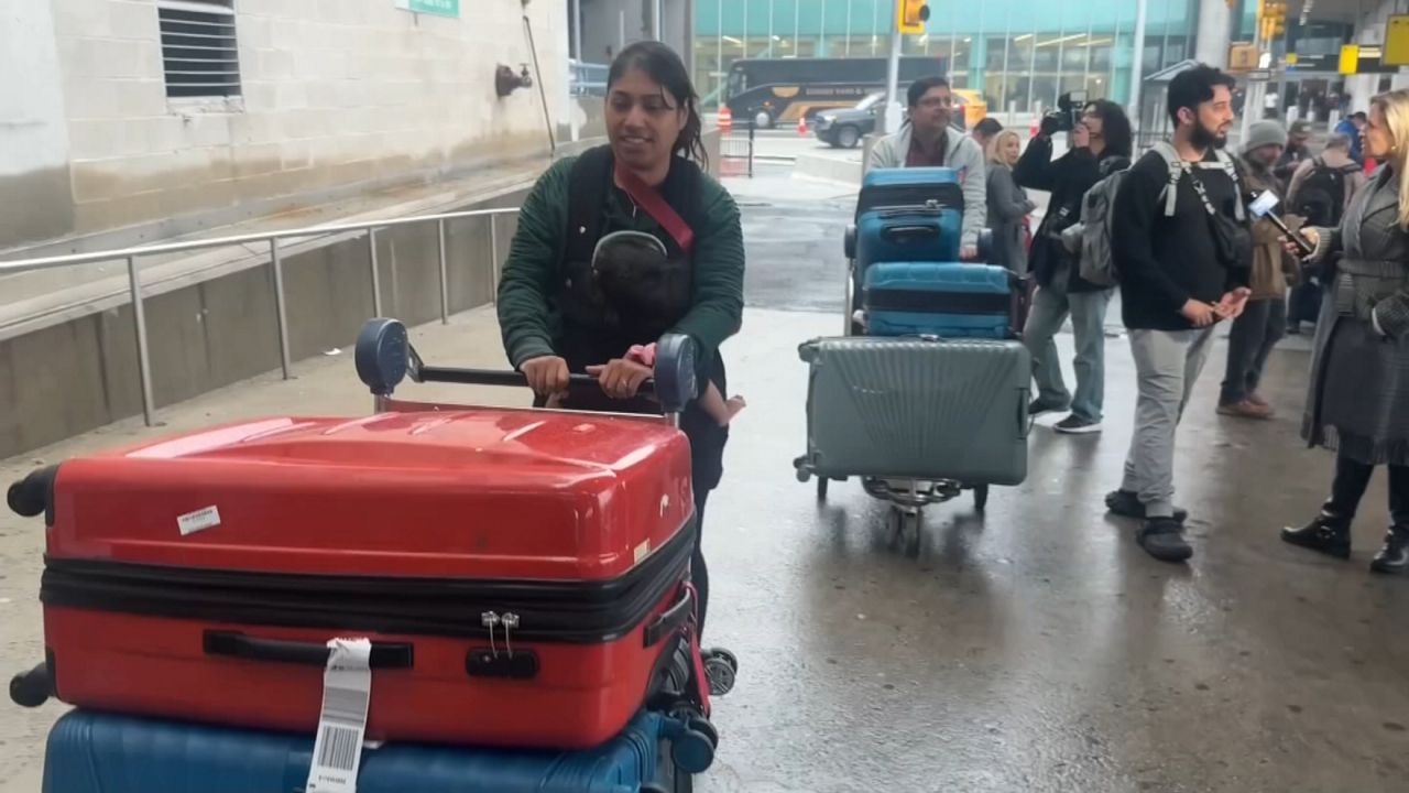 U.S. citizens stuck in Dubai during Middle East conflict arrive at JFK Airport