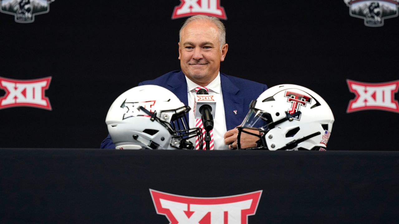 Texas Tech head coach Joey McGuire smiles before speaking to reporters at the NCAA college football Big 12 media days in Arlington, Texas, on July 14, 2022. McGuire has brought an infectious enthusiasm to an already passionate fan base desperate for a title of its own. (AP Photo/LM Otero, File)