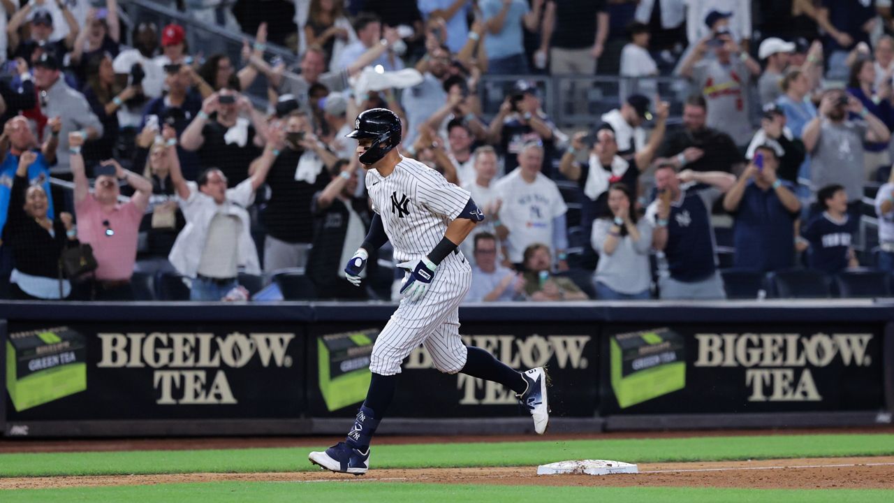 Aaron Judge heads for home after hitting his 60th home run of the season during the ninth inning of a game against the Pirates on Tuesday, Sept. 20, 2022 in New York.