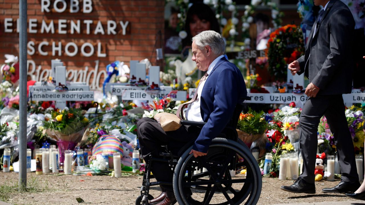 Gov. Abbott at the memorial for victims of the Uvalde shooting. (AP Images)