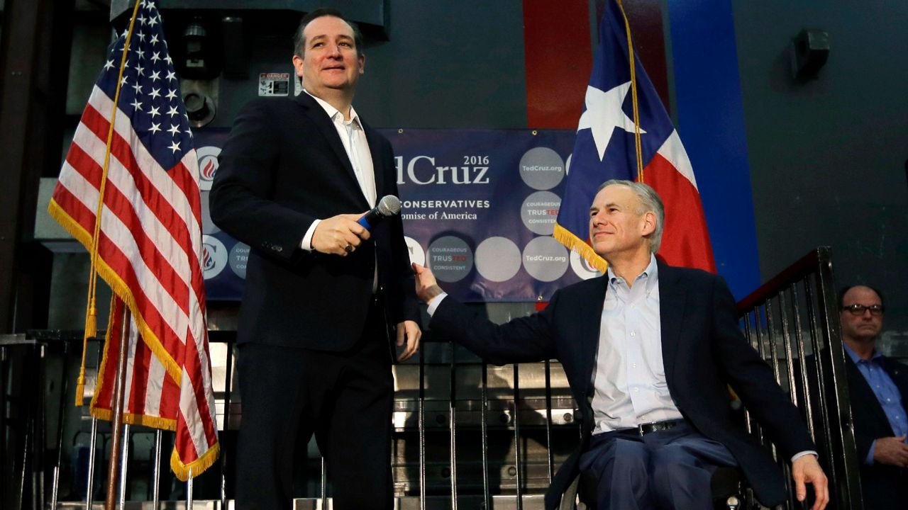 In this Feb. 24, 2016 photo, Sen. Ted Cruz, R-Texas, left, is introduced by Texas Gov. Greg Abbott at a rally in Houston. (AP Photo/David J. Phillip)