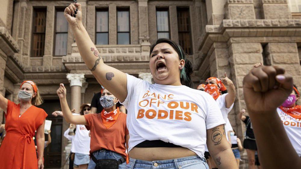 Leen Garza participates in a protest against the six-week abortion ban at the Capitol in Austin, Texas, on Wednesday, Sept. 1, 2021. Dozens of people protested the abortion restriction law that went into effect Wednesday. (Jay Janner/Austin American-Statesman via AP)