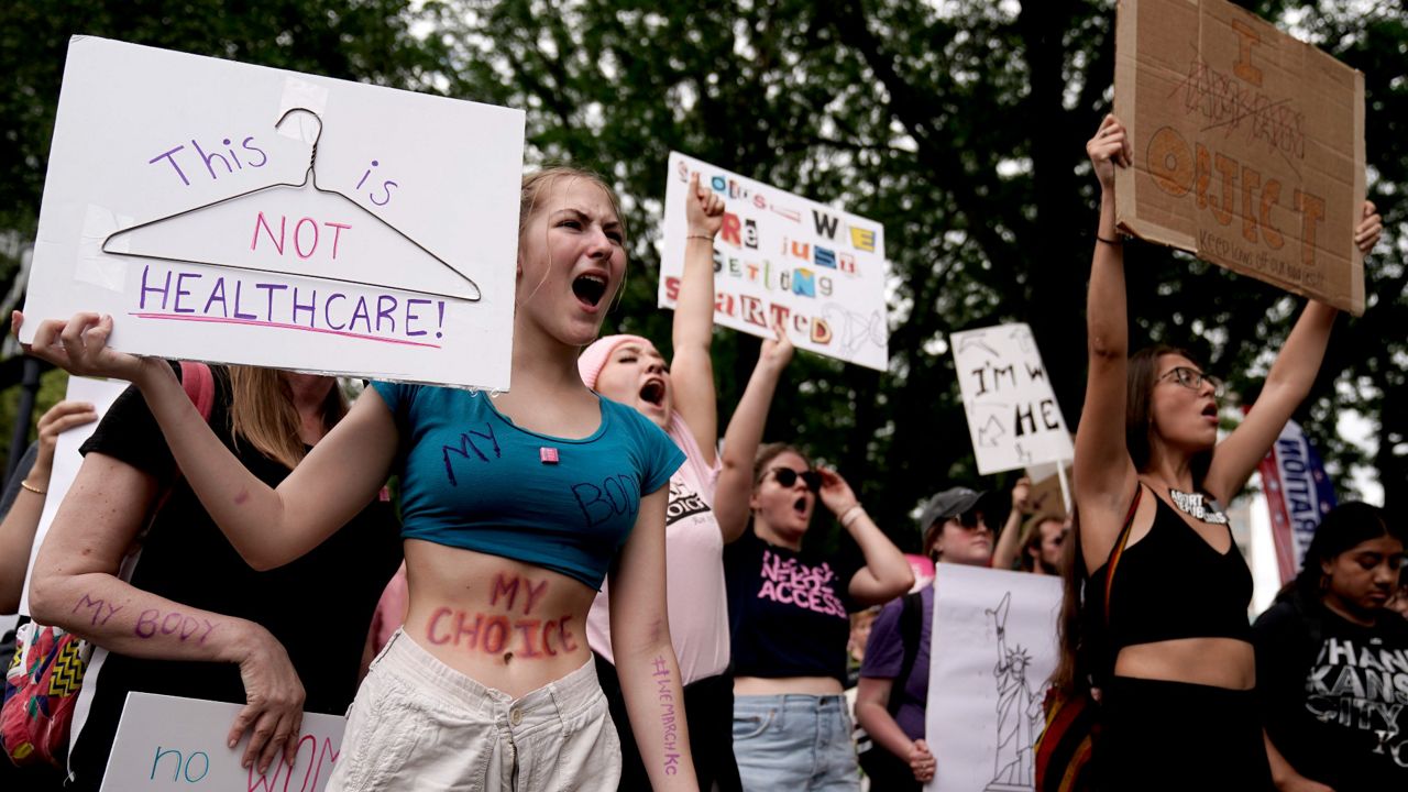Protesters rally in support of abortion rights on July 2 in Kansas City, Mo. (AP Photo/Charlie Riedel, File)