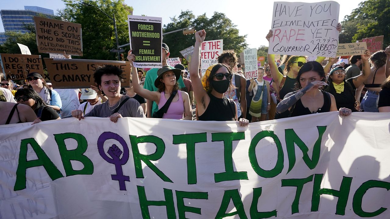 Demonstrators march and gather near the Texas state Capitol in Austin following the Supreme Court's decision to overturn Roe v. Wade on June 24, 2022. A pregnant Texas woman whose fetus has a fatal diagnosis asked a court Tuesday, Dec. 5, 2023, to let her terminate the pregnancy, bringing what her attorneys say is the first lawsuit of its kind in the U.S. since Roe v. Wade was overturned last year. (AP Photo/Eric Gay, File)