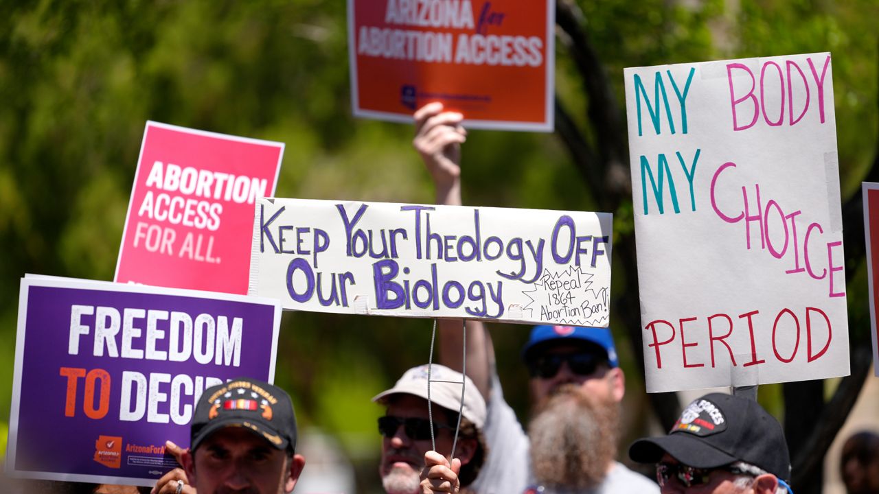 Abortion rights supporters gather outside the Capitol, April 17, 2024, in Phoenix. (AP Photo/Matt York)