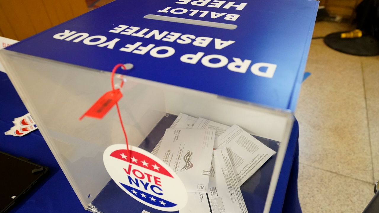 Absentee ballots are seen in a sealed ballot box during early voting in the primary election, Monday, June 14, 2021, in SoHo. (AP Photo/Mary Altaffer)