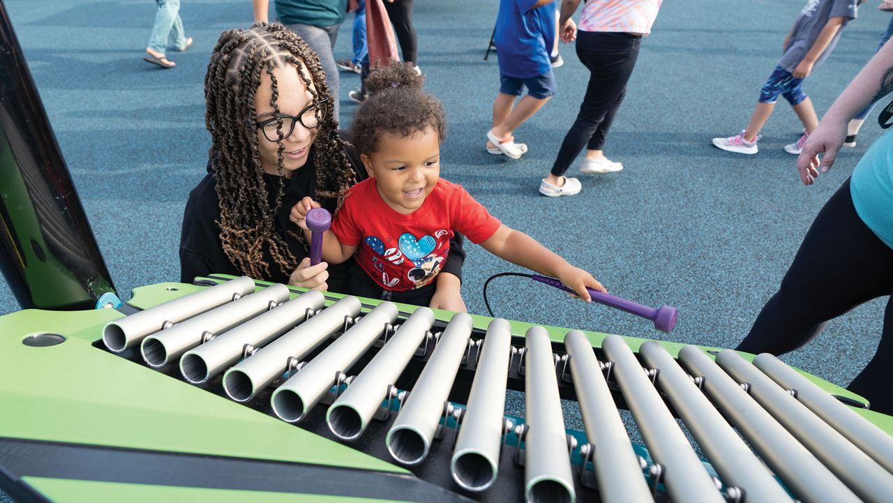 Child plays at playground