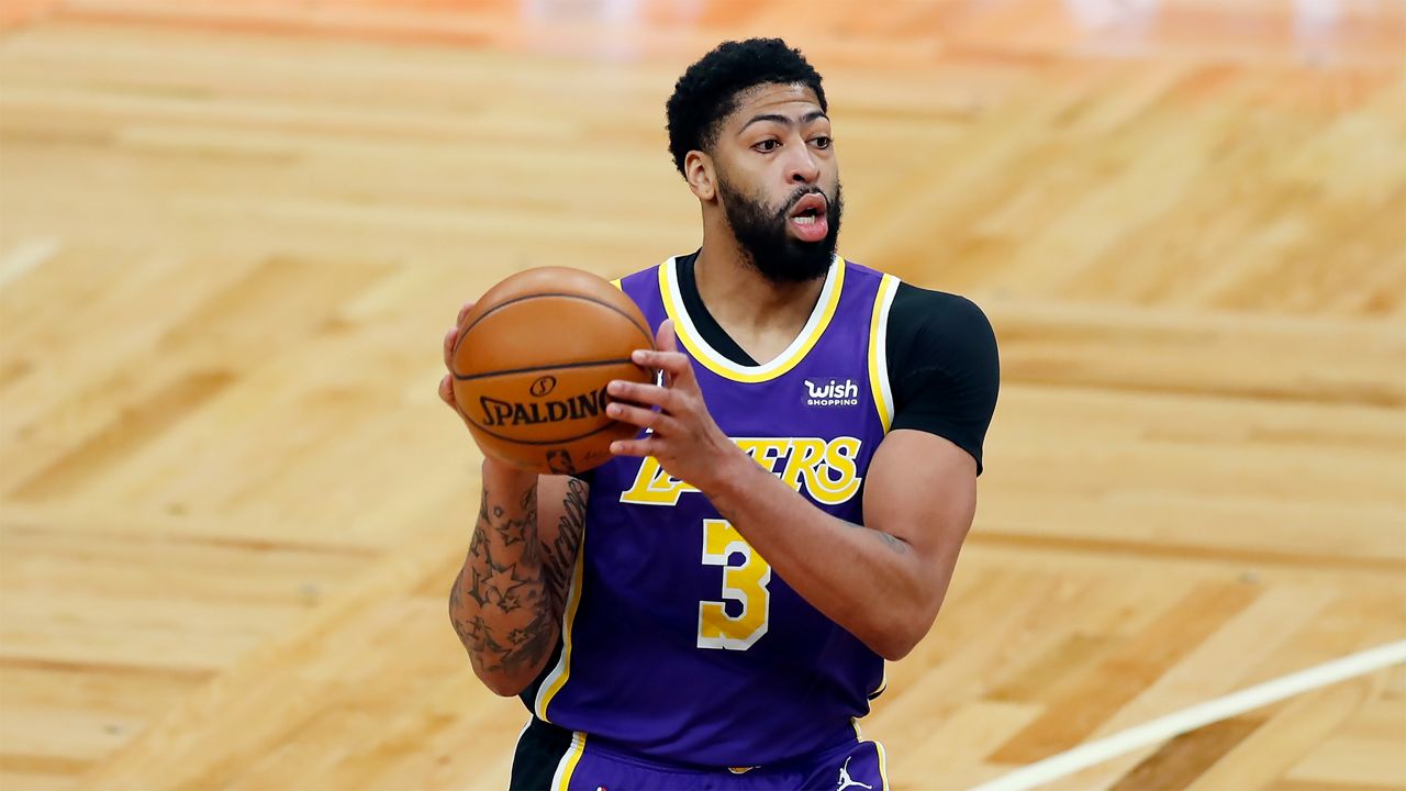 Los Angeles Lakers' Anthony Davis plays against the Boston Celtics during the first half of an NBA basketball game, Saturday, Jan. 30, 2021, in Boston. (AP Photo/Michael Dwyer)