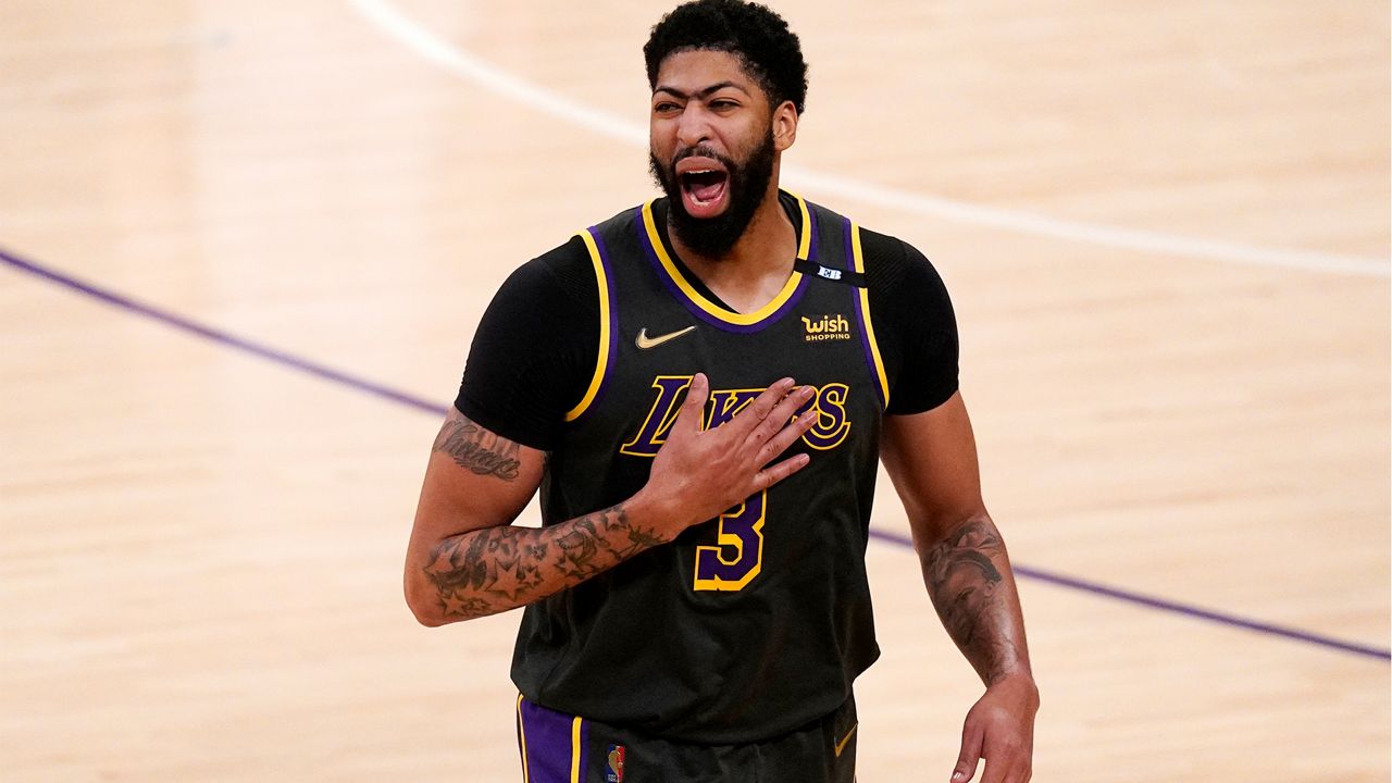 Los Angeles Lakers forward Anthony Davis celebrates after the Lakers defeated the Denver Nuggets 93-89 in a NBA basketball game Monday, May 3, 2021, in Los Angeles. (AP Photo/Mark J. Terrill)