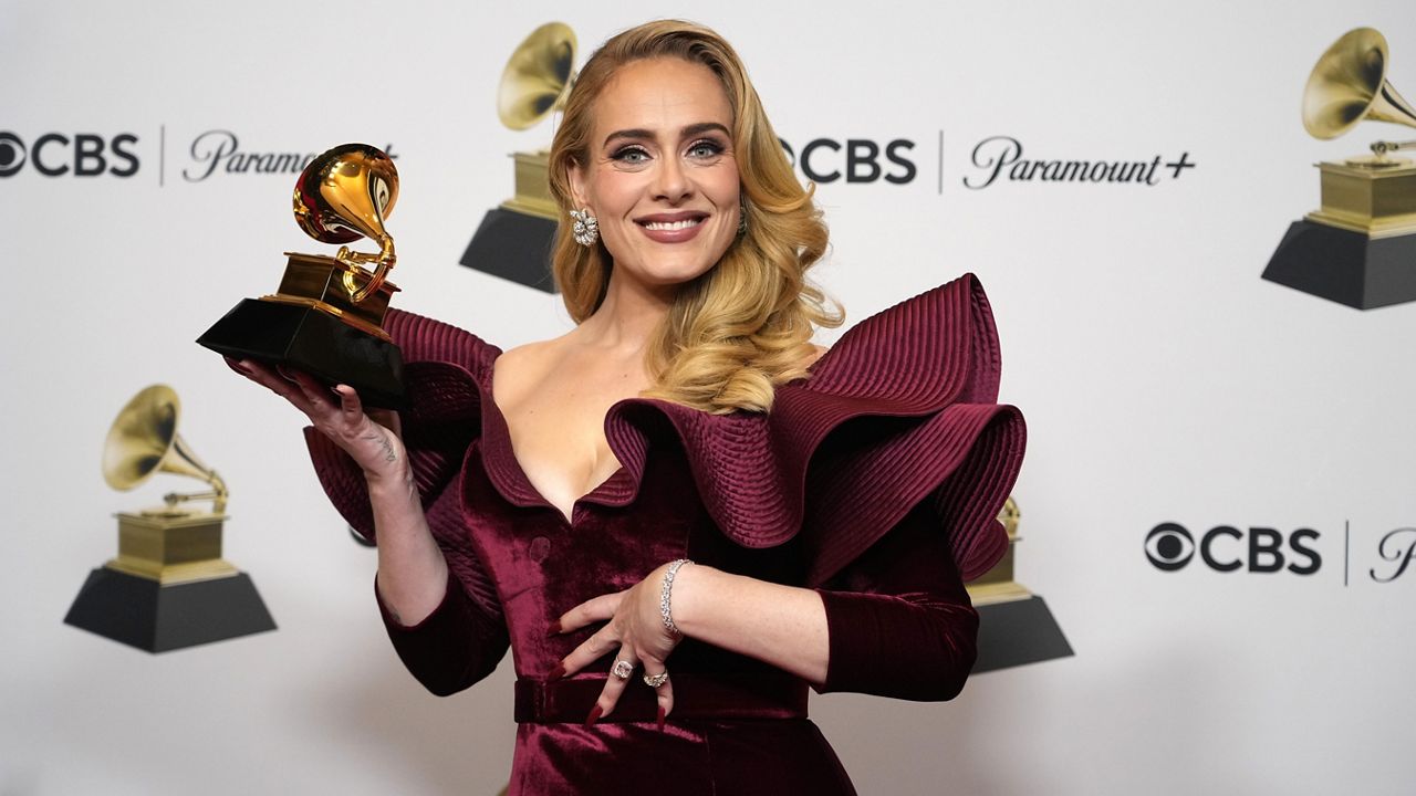 Adele poses in the press room at the 65th annual Grammy Awards on Feb. 5, 2023, in Los Angeles. (AP Photo/Jae C. Hong, File)