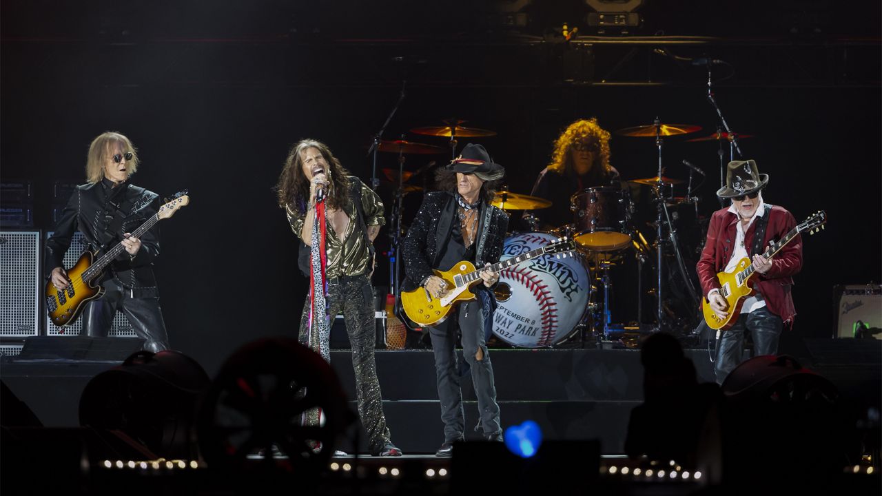 Tom Hamilton, from left, Steven Tyler, Joe Perry, John Douglas and Brad Whitford of Aerosmith, perform on Sept. 8, 2022, at Fenway Park in Boston. (Photo by Winslow Townson/Invision/AP)