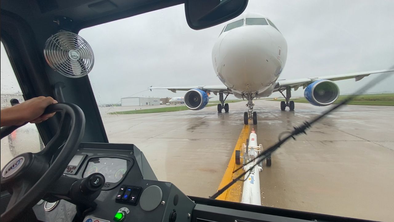 Cody Albrecht moves an Allegiant A320 away from the terminal at Appleton International Airport in Greenville, Wisconsin.