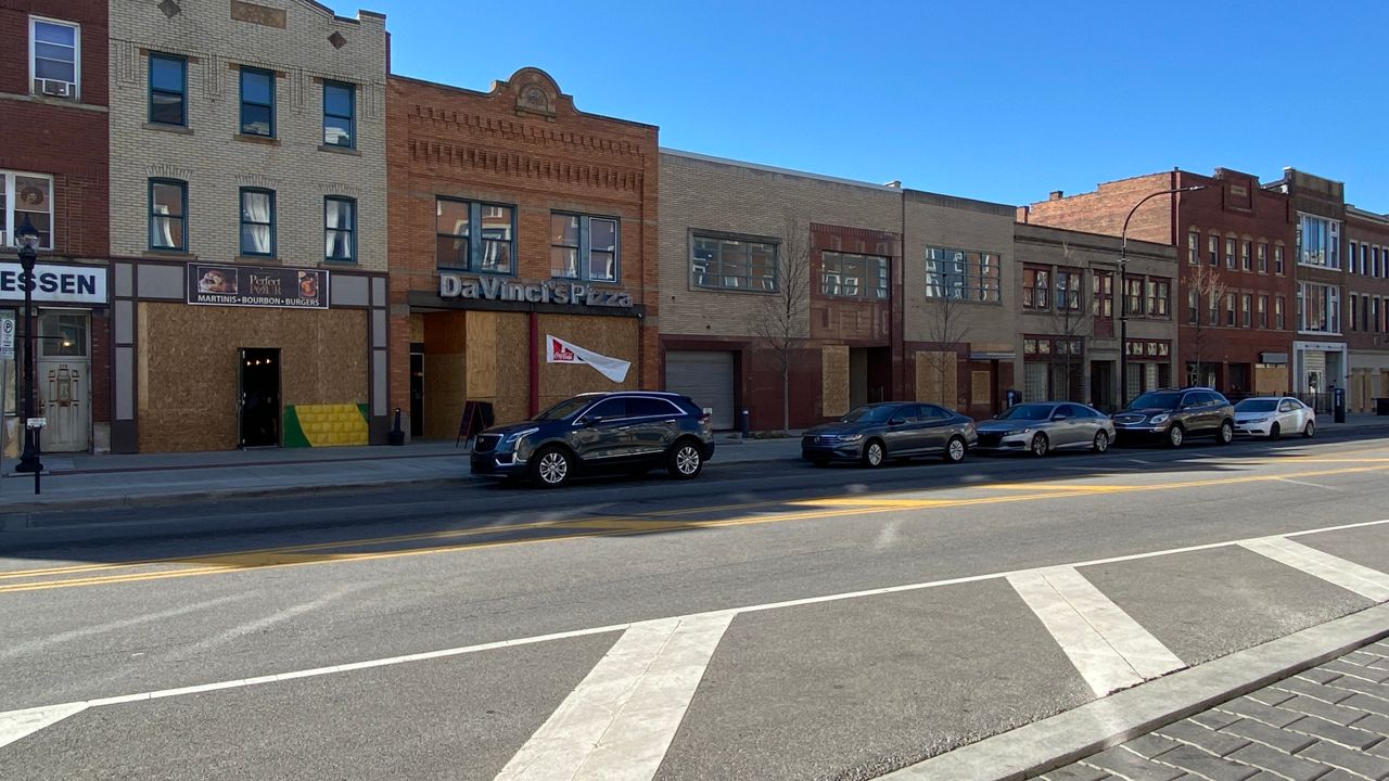 Businesses in Akron boarded their windows. (Spectrum News 1/ Jenn Conn)