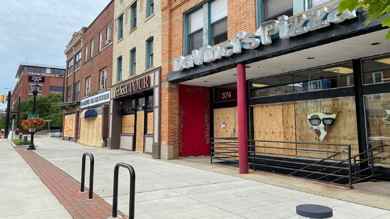 Businesses boarded up windows as protests continued for Jayland Walker's death. (Jenn Conn Spectrum News 1)