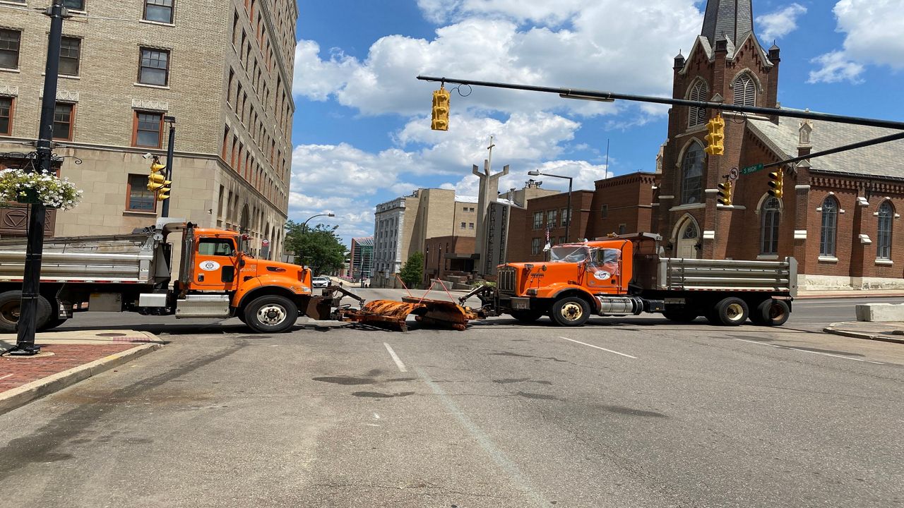 The city uses snow plows to block the main block of High Street at different times of the day since protest began over the Jayland Walker shooting. (Jennifer Conn/Spectrum News)