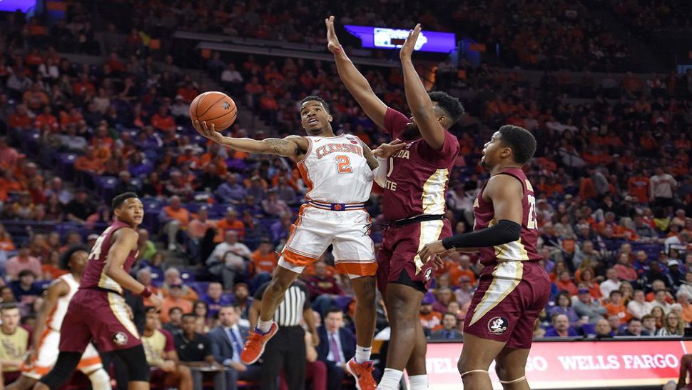 Freshman Al-Amir Dawes took the ball down the lane and flipped up the game-winning shot for Clemson.