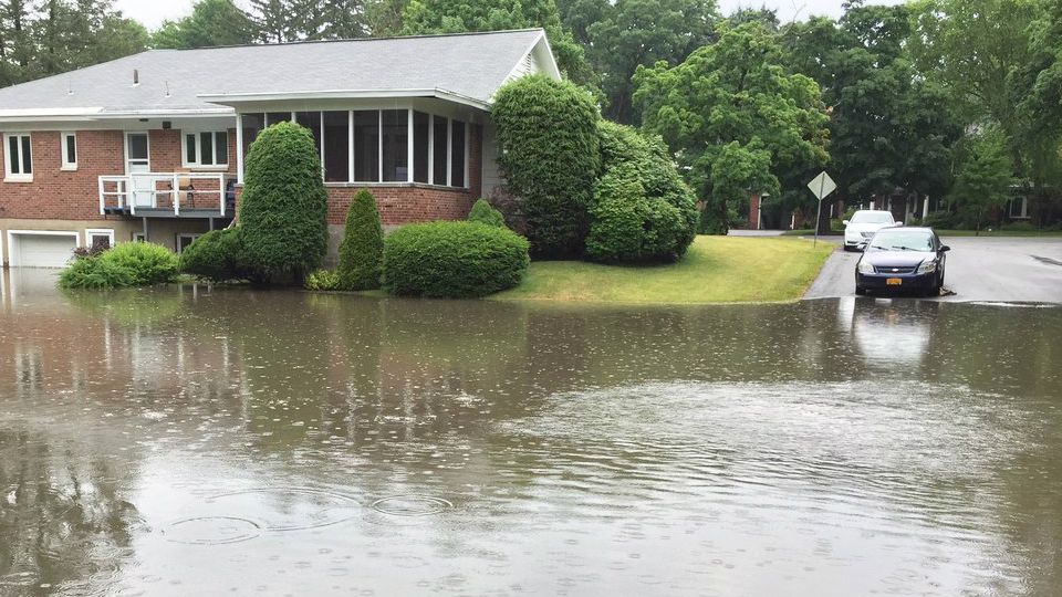 Heavy rain floods homes and businesses